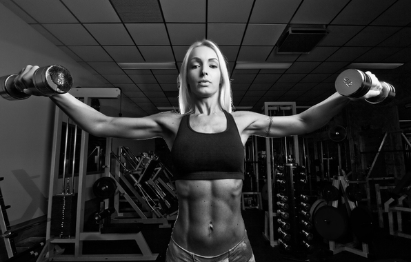 woman-fitness-dumbbells-pose