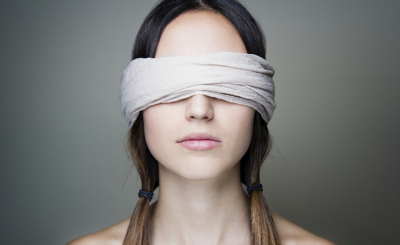 Naked blindfold woman